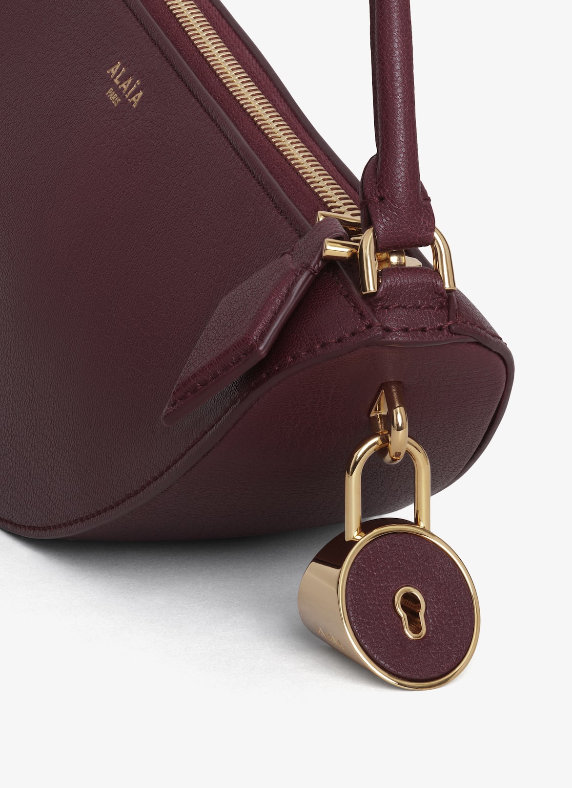 LE DEMI-CŒUR BAG IN LEATHER ALAÏA DARK RED LE DEMI-CŒUR BAG IN LEATHER